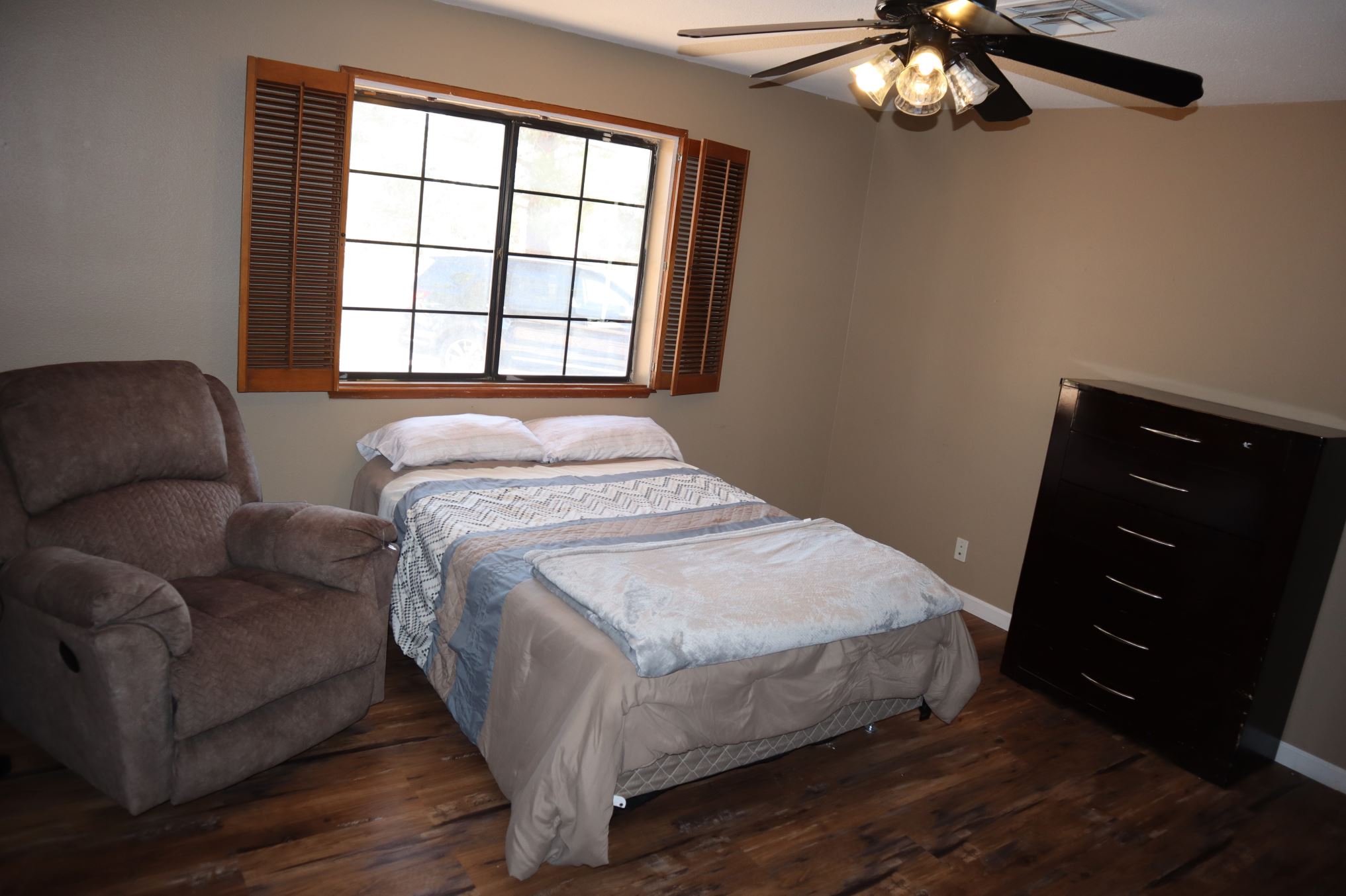 Large Bedroom with Recliner